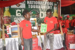 Afrodigital Promotions CEO, Nudzor Agbanu presents certificates to a finalist