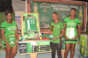 National-Pool-Tournament-2015-winner-poses-with-prizes