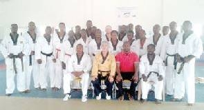 Five earn black belts in Taekwondo