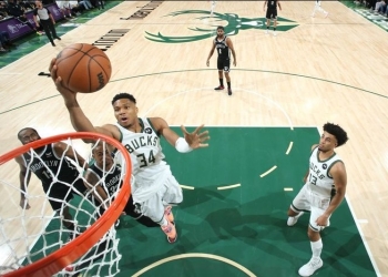 Milwaukee Bucks begin NBA title defence with 127-104 victory over hot favourites Brooklyn Nets
