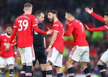 Manchester United charged by FA after players surrounded referee Peter Bankes during Brighton win