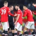 Manchester United charged by FA after players surrounded referee Peter Bankes during Brighton win