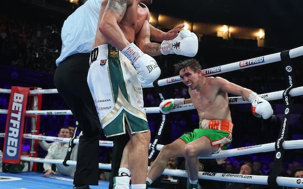 Wood KOs Conlan in 12, retains WBA belt