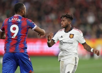 Jordan Ayew clash with Fred during Crsytal Palace defeat to Man United in pre-season