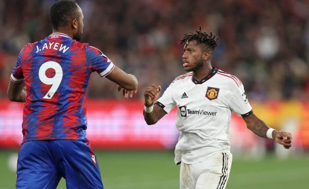Jordan Ayew clash with Fred during Crsytal Palace defeat to Man United in pre-season