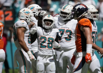 Dolphins rout Broncos 70-20, scoring most points in a game since 1966