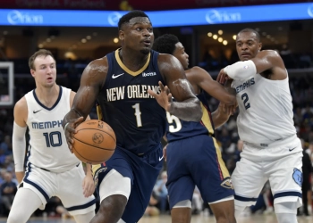 CJ McCollum and Zion Williamson lead Pelicans past Grizzlies 111-104 in season opener
