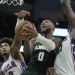 Lillard sets Bucks record with 39 points in a debut, leads Milwaukee past Philadelphia 118-117