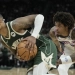 Lillard sets Bucks record with 39 points in a debut, leads Milwaukee past Philadelphia 118-117