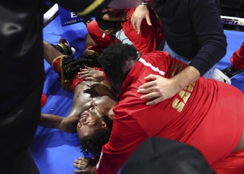 Raymond Ford wins featherweight title with 12th-round miracle TKO