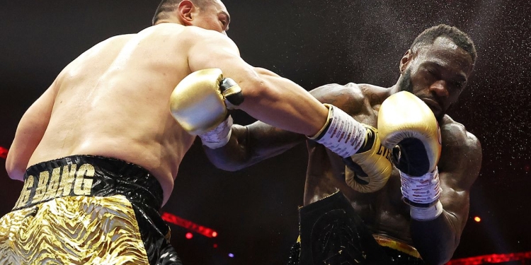 Zhilei Zhang finishes Deontay Wilder in brutal 5th-round TKO