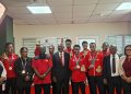Golden Shuttlers receive rousing welcome after five-medal Cairo haul